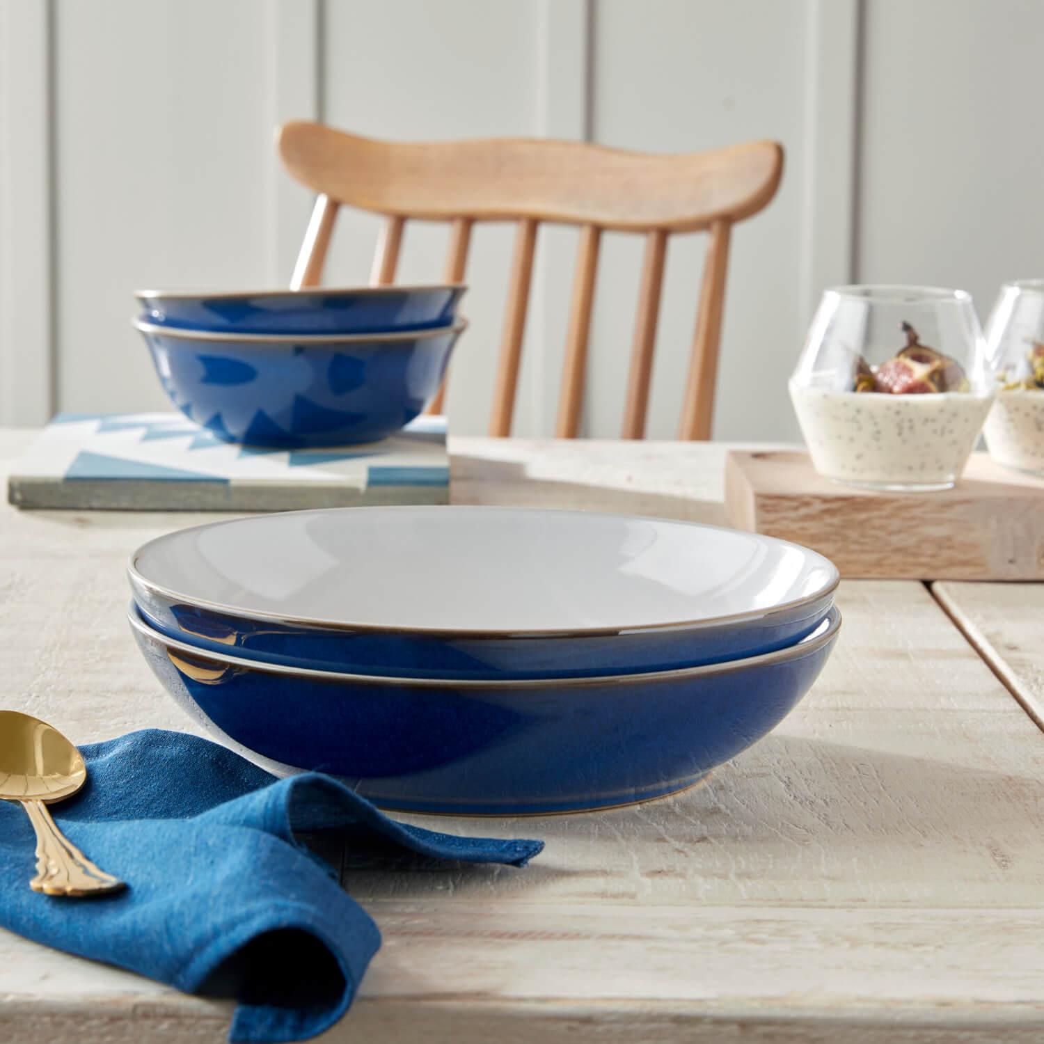 https://www.potterscookshop.co.uk/cdn/shop/products/Denby-Pottery-Imperial-Blue-Stoneware-Range-Lifestyle_4_2a4ee283-2393-41e1-a26e-549ecfc4a8fc.jpg?v=1657122371